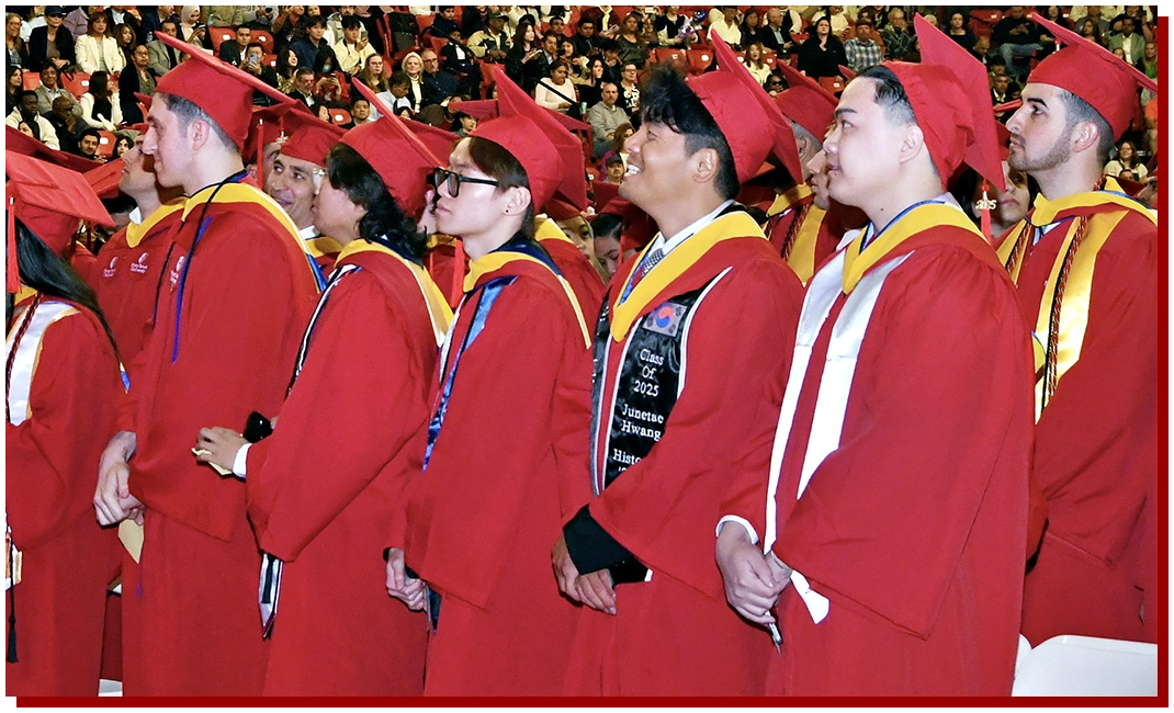 SUNY Stony Brook College of Business 2025 Convocation Graduates Moving their tassles to the graduated side of thier caps