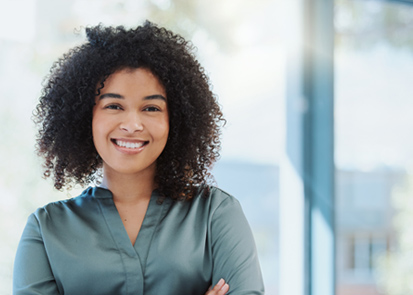 Professional woman smiling - strategic and innovative thinking