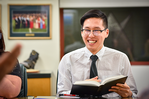 Smiling student in seminar setting